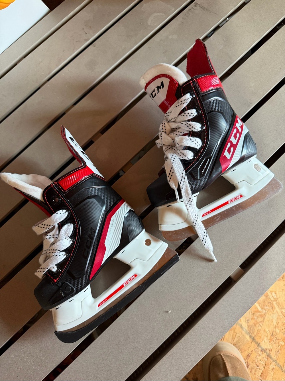 CCM Youth Ice Skates in Black and Red